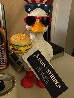 Patriotic Duck Figurine Holding Burger - Red, White & Blue